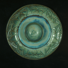 Carved stoneware plate